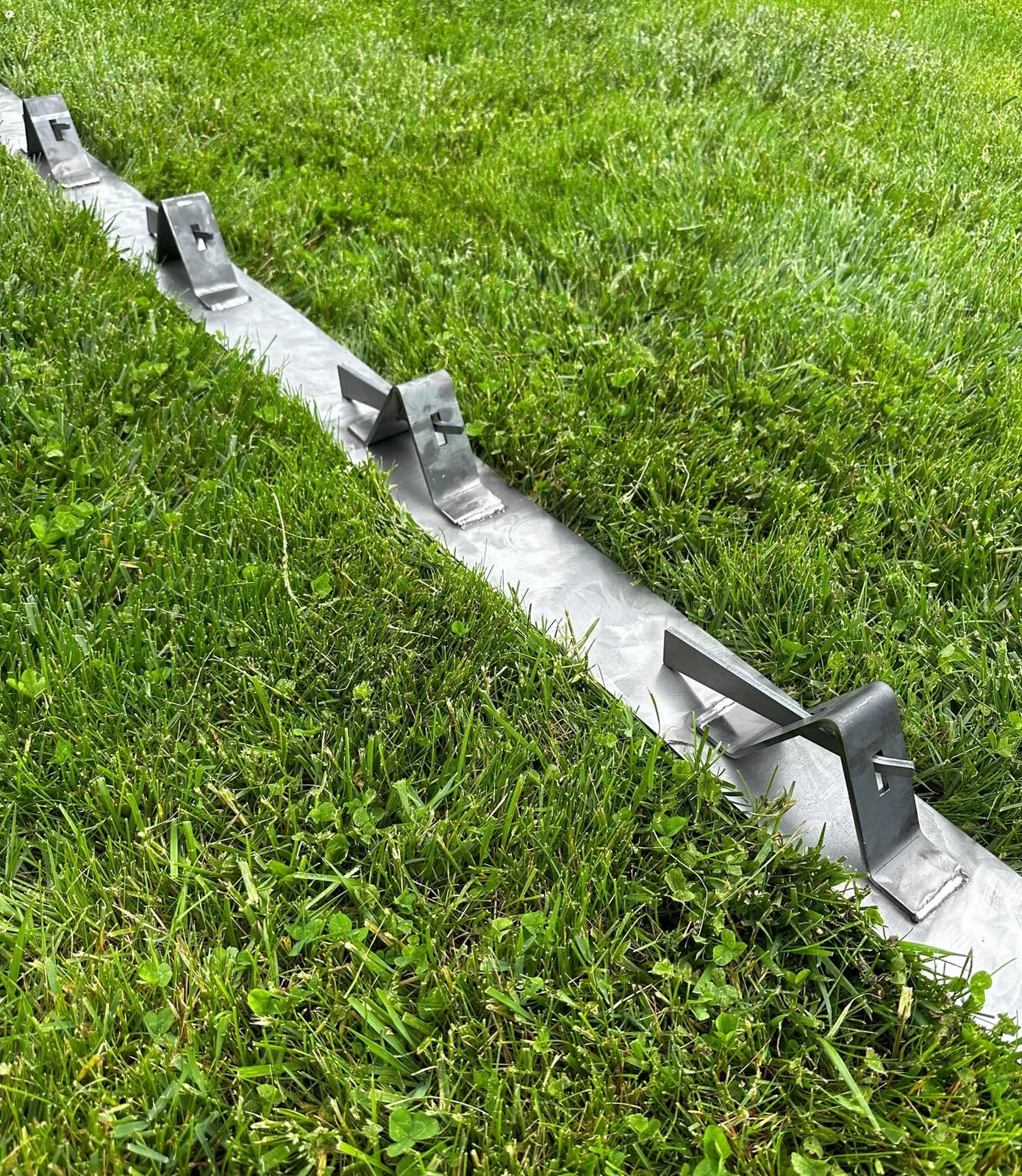 Close view of a flexible flatwork concrete form following a curve